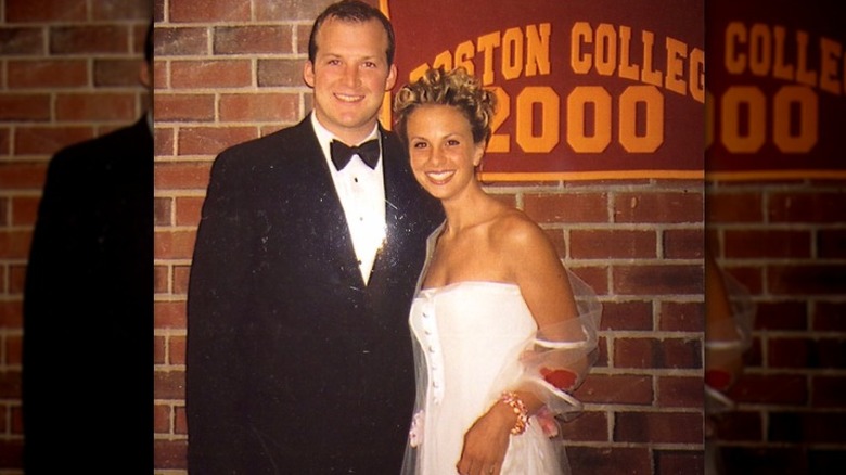 Elisabeth and Tim Hasselbeck posing at college dance