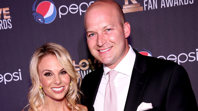 Tim and Elisabeth Hasselbeck posing on red carpet