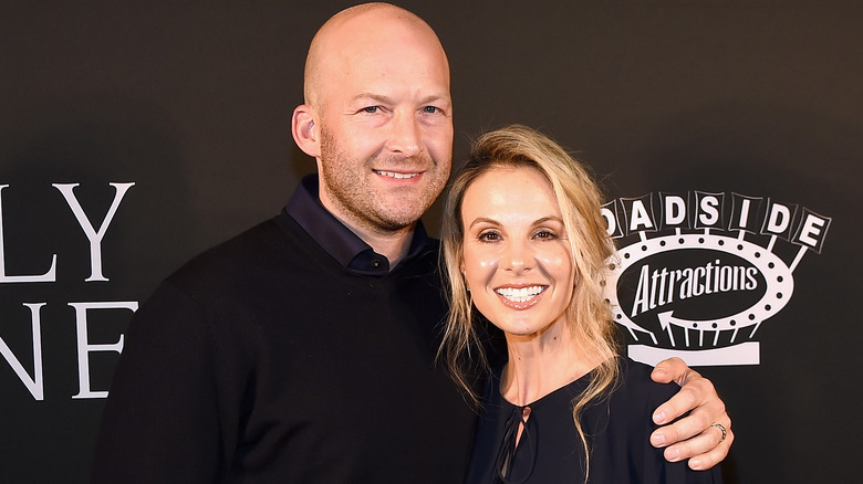 Elisabeth and Tim Hasselbeck embracing