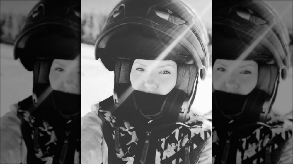 Elisha Cuthbert snowmobiling 
