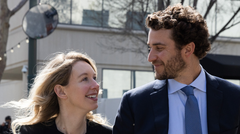 Elizabeth Holmes smiling at William Evans