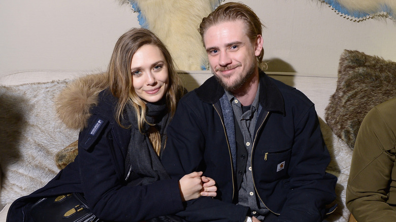 Elizabeth Olsen with Boyd Holbrook smiling