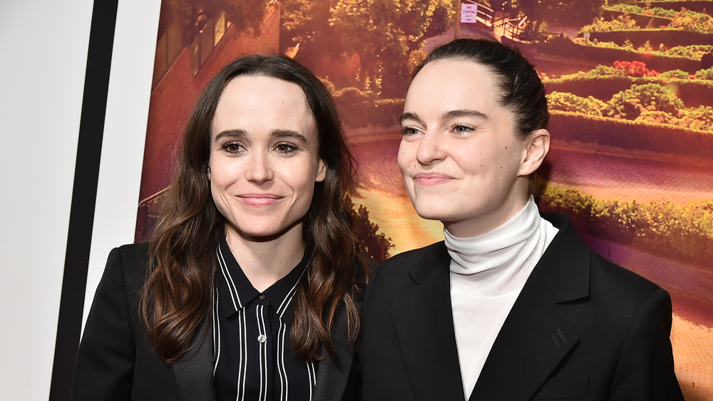 Elliot Page and wife Emma Portner smiling