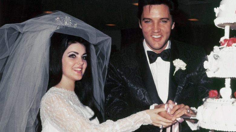 Priscilla Presley and Elvis Presley smiling  