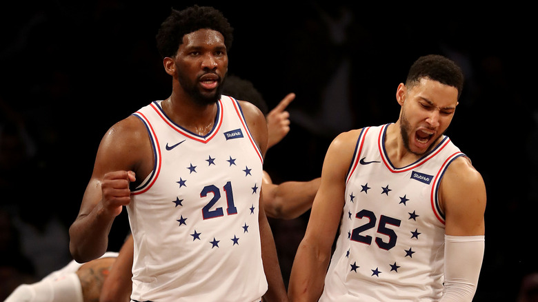 Ben Simmons and Joel Embiid at an event 