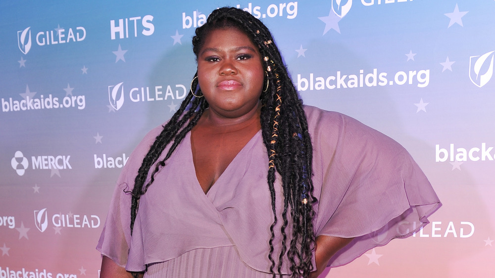 Gabourey Sidibe posing for camera