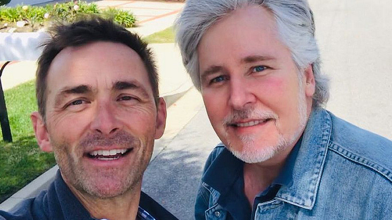 James Patrick Stuart and Michael E. Knight smiling