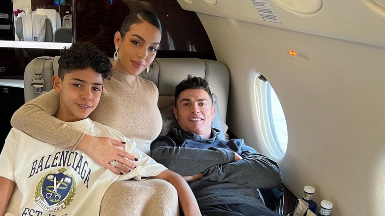 Georgina Rodriguez wraps arm around Junior and Cristiano Ronaldo