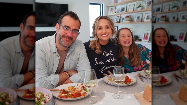 Shane Farley with Giada De Laurentiis and her daughter Jade in the kitchen, smiling