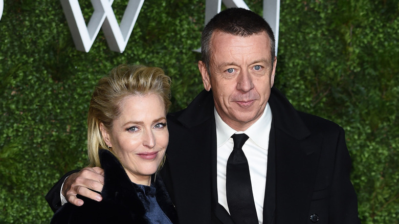 Gillian Anderson and Peter Morgan at an event 