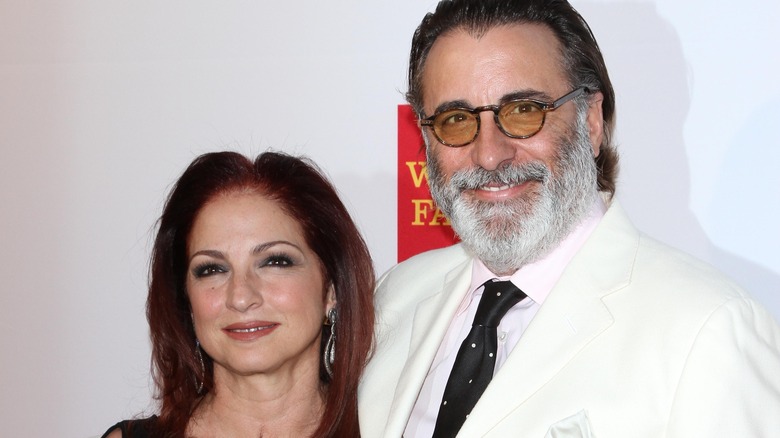 Gloria Estefan and Andy Garcia, both smiling