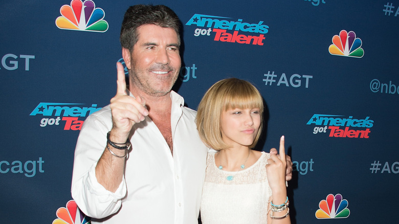 Simon Cowell, Grace VanderWaal posing