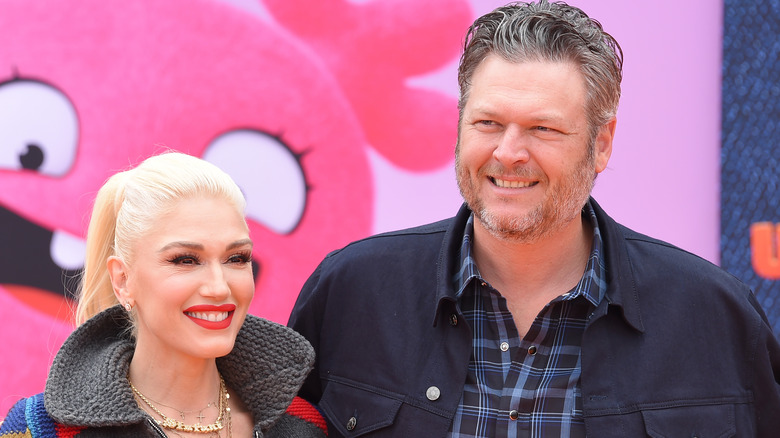 Gwen Stefani and Blake Shelton at an event 