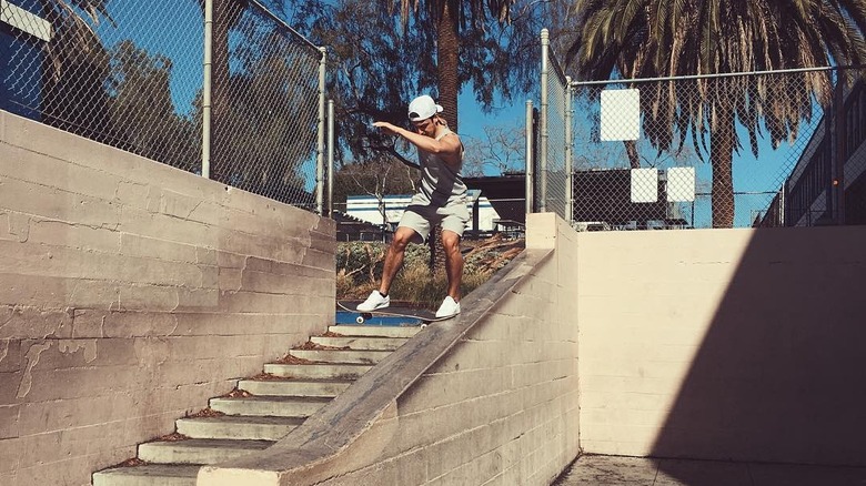 Tyler Hynes tailsliding on skateboard