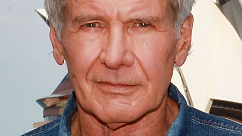 Harrison Ford gray hair blue jean shirt
