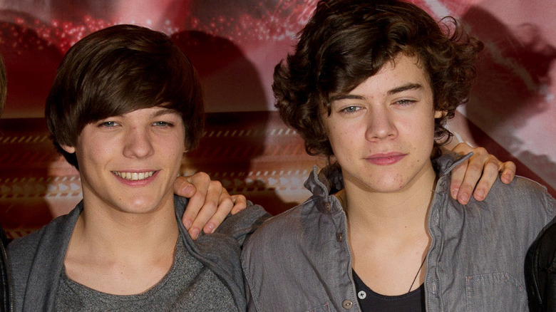 Louis Tomlinson and Harry Styles younger 