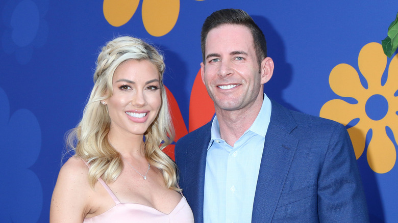 Heather Rae Young and Tarek El Moussa smile 