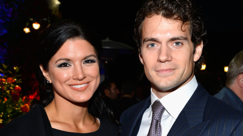 Gina Carano and Henry Cavill at an event in 2013