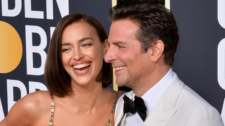 Irina Shayk and Bradley Cooper laughing