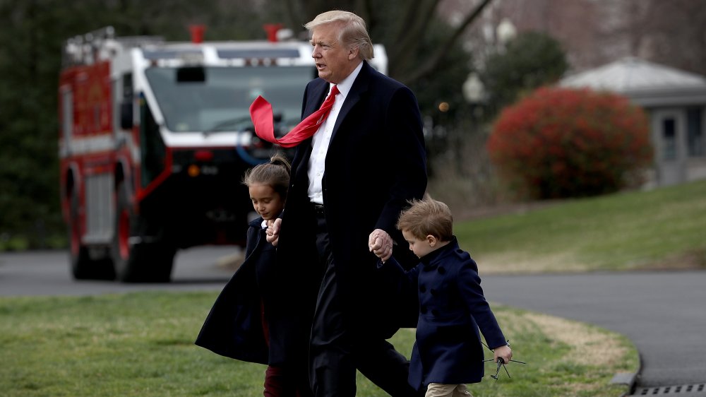 Trump with two of his and Ivana's grandchildren