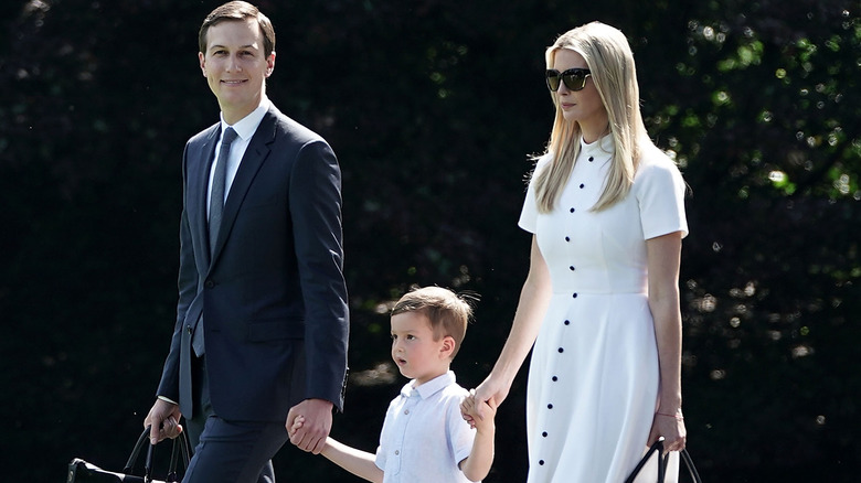 Ivanka Trump, Jared Kushner and son at an event 