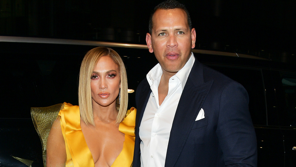 Jennifer Lopez and Alex Rodriguez posing together at an event