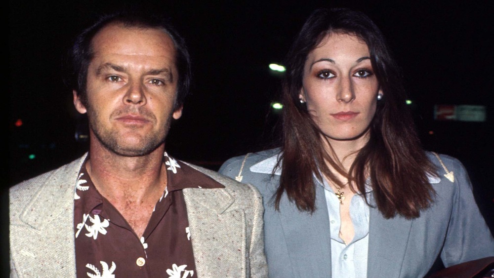 Jack Nicholson and Anjelica Huston looking tense