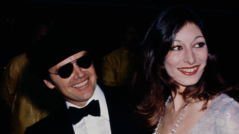 Jack Nicholson and Anjelica Huston smiling together