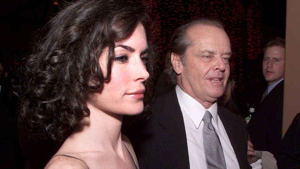 Lara Flynn Boyle looking sad at a party with Jack Nicholson