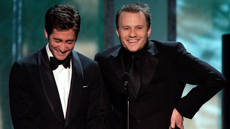 Jake Gyllenhaal and Heath Ledger laughing