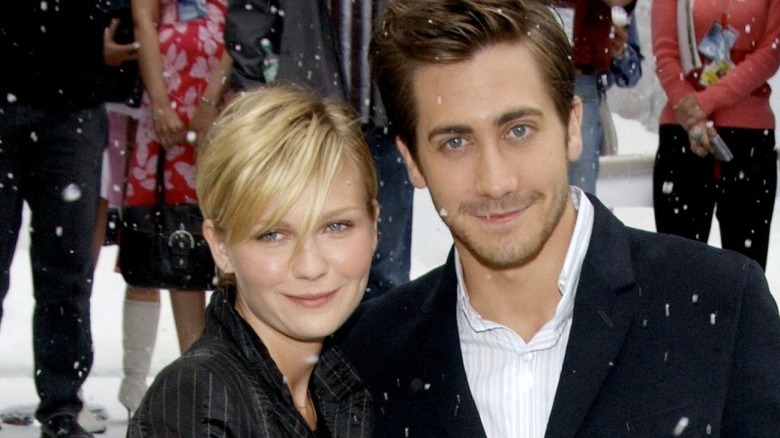 Kirsten Dunst and Jake Gyllenhaal posing