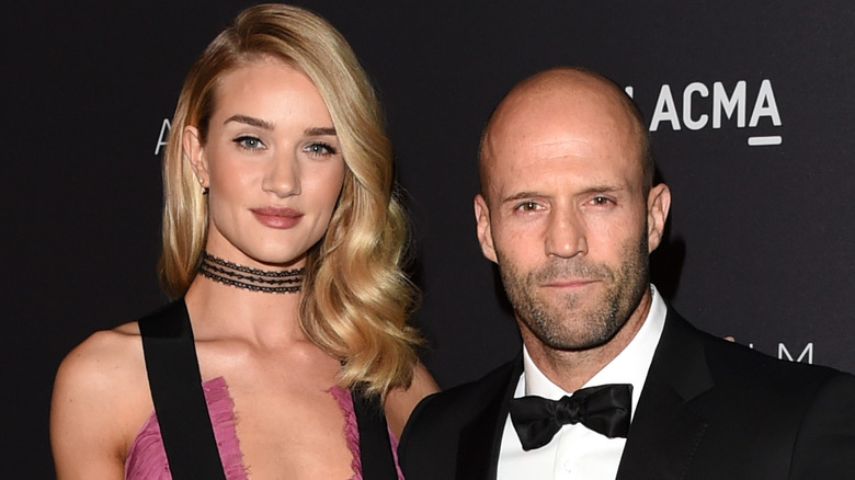 Jason Statham and Rosie Huntington-Whiteley posing