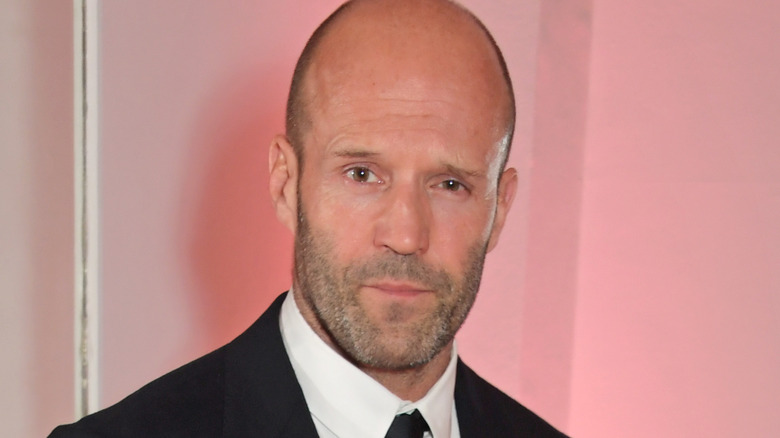 Jason Statham posing for a photo