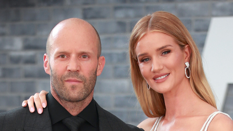 Jason Statham and Rosie Huntington-Whiteley posing