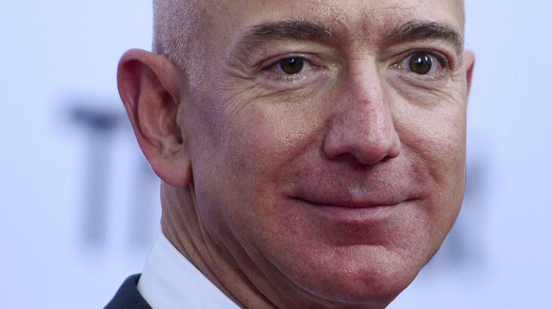 Jeff Bezos smiles at an event