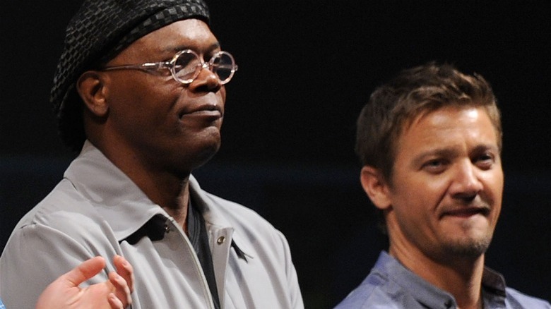 Samuel L. Jackson and Jeremy Renner standing