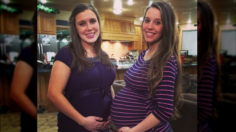 Anna Duggar, Jill Duggar cradling baby bumps