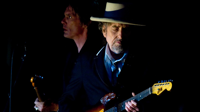 Jimmy Carter; Bob Dylan smiling and posing