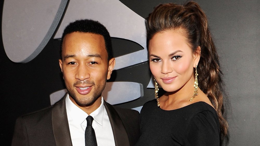 John Legend and Chrissy Teigen both in formal attire