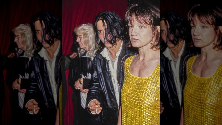 Johnny Depp with Ellen Barkin in the 1990s