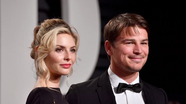 Tamsin Egerton and Josh Hartnett looking off-camera