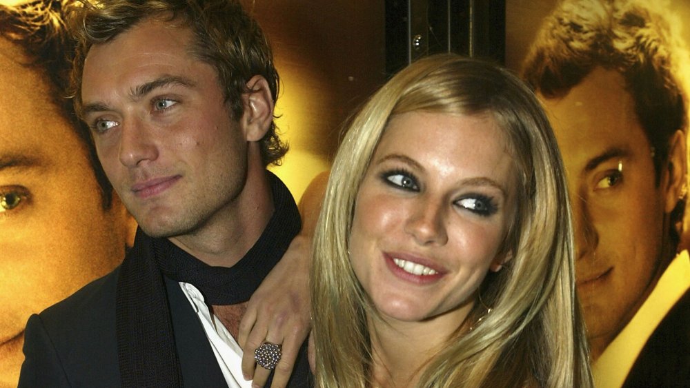 Jude Law and Sienna Miller at the Alfie premiere in 2004