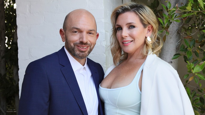 June Diane Raphael and Paul Scheer posing