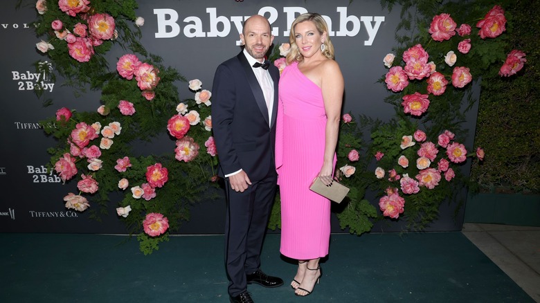 June Diane Raphael and Paul Scheer smiling