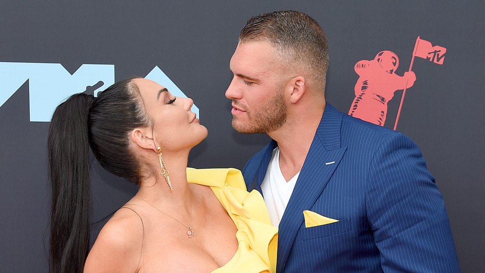 JWoww poses with then-boyfriend Zack Carpinello on the red carpet