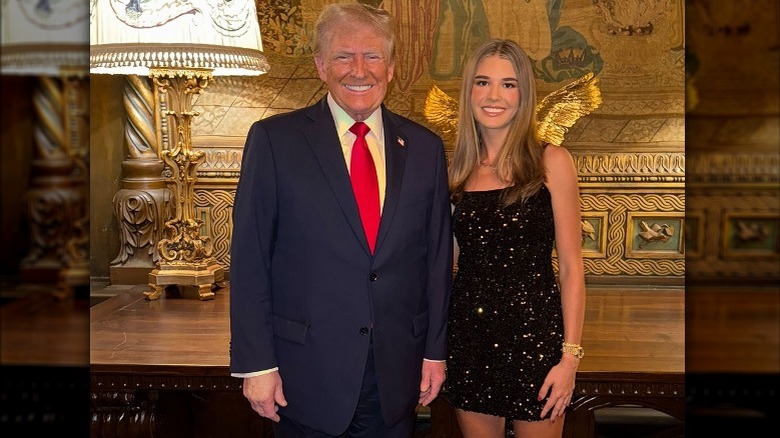 Donald Trump and Kai Trump pose at Mar-A-Lago