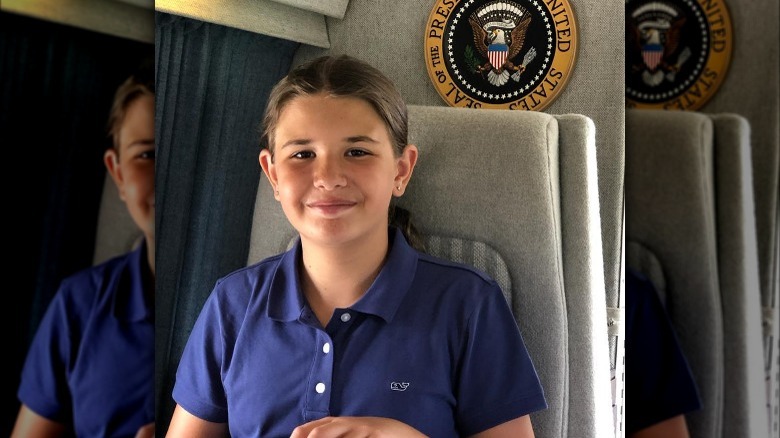 A young Kai Trump sits aboard Marine One