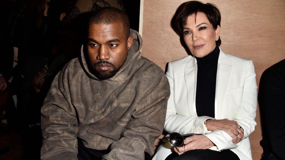 Kanye West and Kris Jenner seated together