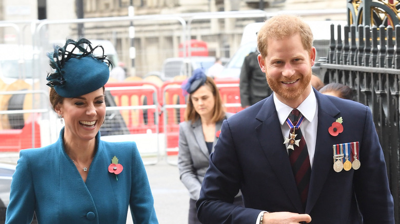 Kate Middleton and Prince Harry walk together