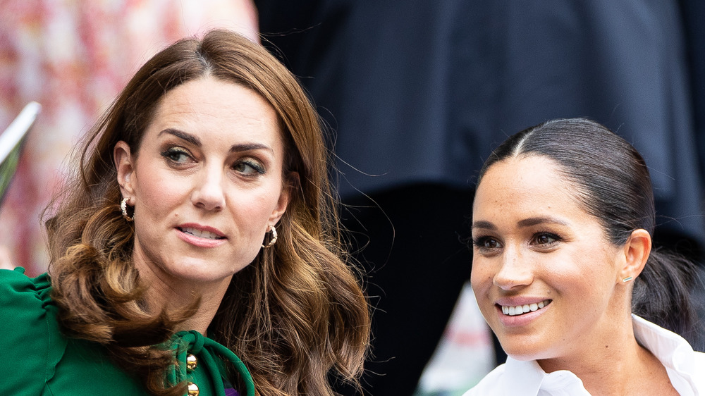 Kate Middleton and Meghan Markle at an event